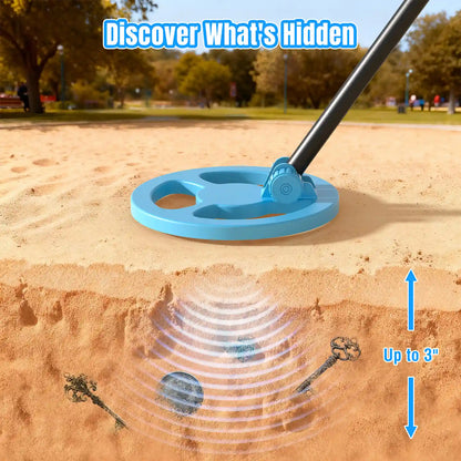 Raddy MD65K Kid Metal Detector on sandy ground with illustration of detecting objects up to 3 inches deep.