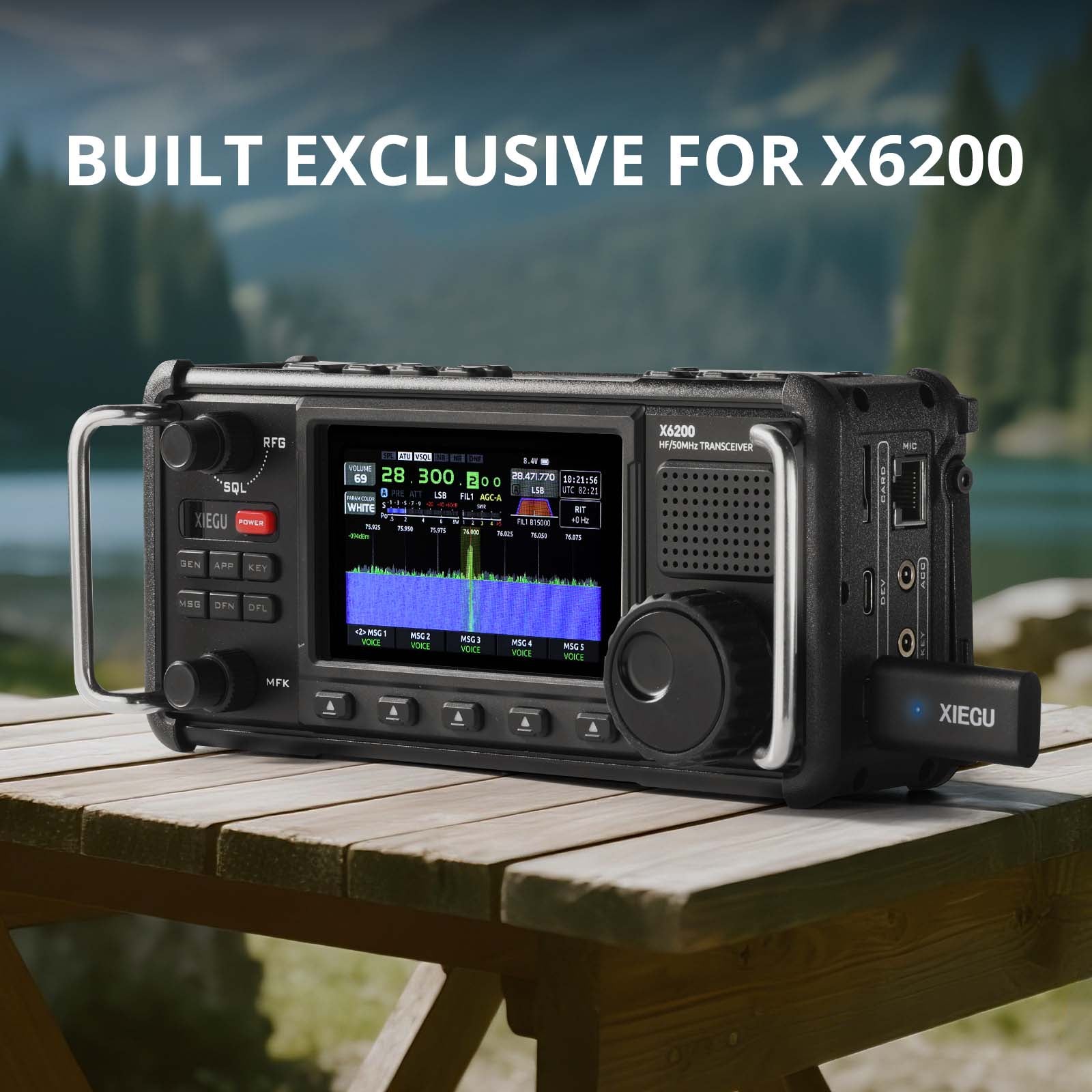 Transceiver radio on a wooden table with scenic background